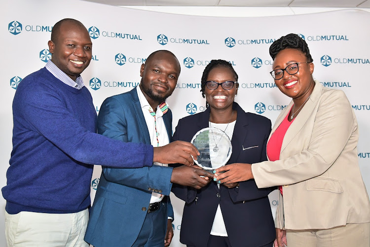 Old Mutual General Manager for Life Distribution Evans Manduku, acting MD Life Business Calvince Onduru, Top Performer Pensions Jackline Muiga and Head of Pensions , Christine Karoki.