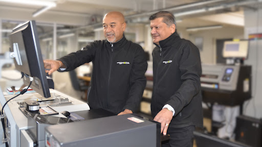 African Sun Media Managing Director, Nirode Bramdaw, with his Colour Division Manager, Ruben Ardendorff, who has been with company since inception. (Pic: Arin Barry)