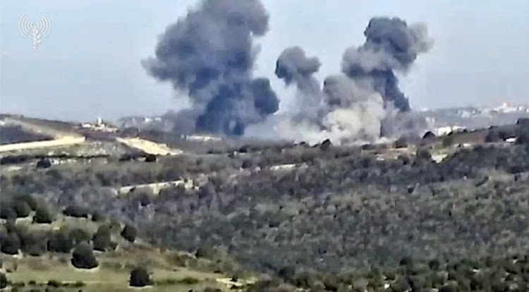 Smoke rises following what the Israeli armed forces say was an air strike on Hezbollah targets at a location given as Lebanon, in this screen grab obtained from a video released on January 8, 2024. Picture: ISRAEL DEFENSE FORCES/HANDOUT via REUTERS THIS IMAGE HAS BEEN SUPPLIED BY A THIRD PARTY