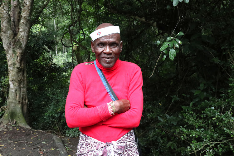 Sangoma Kwanana Sola on a visit to the Isinuka Mud Caves and Sulphur Pools.