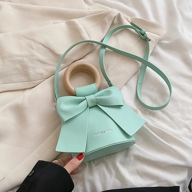 Women's Fashion Handbag with Bow A stylish accessory. Perfect for adding elegance to any outfit. Carry your essentials i