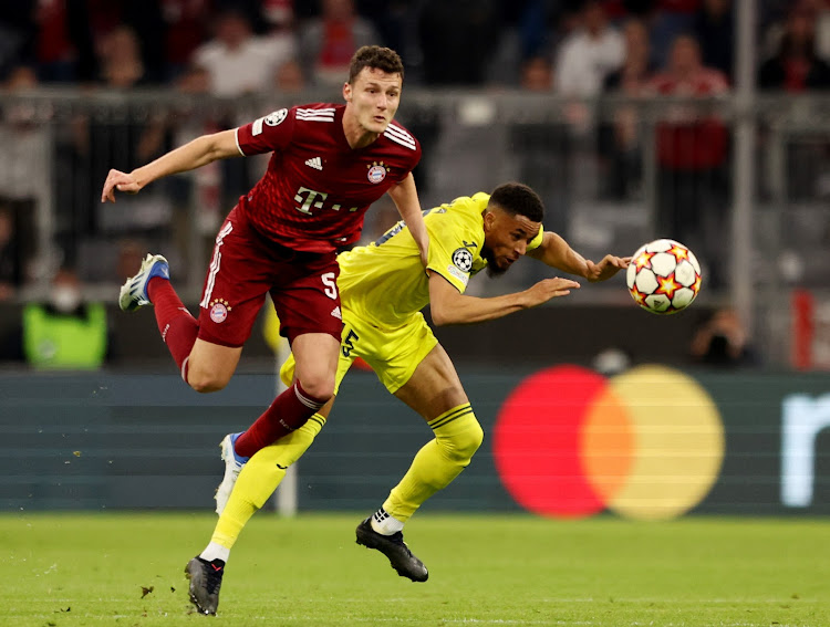 Bayern Munich's Benjamin Pavard in action with Villarreal's Arnaut Danjuma