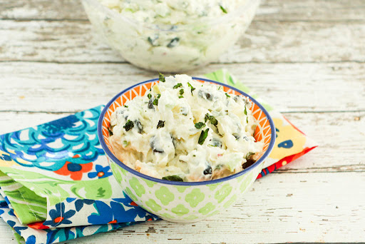 A bowl of Eggless Potato Salad.