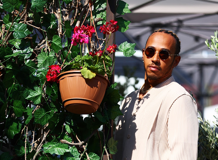 Lewis Hamilton looks on in the paddock during previews ahead of the F1 Grand Prix of Azerbaijan at Baku City Circuit on June 09 2022 in Baku, Azerbaijan.