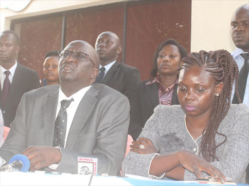 West Kenya LSK Kisumu chapter chairman Francis Olel with lawyers Sam Onyango (L) and Dorothy Omboto (R) among other advocates at a press conference in Kisumu on Thursday. Photo/JUSTUS OCHIENG