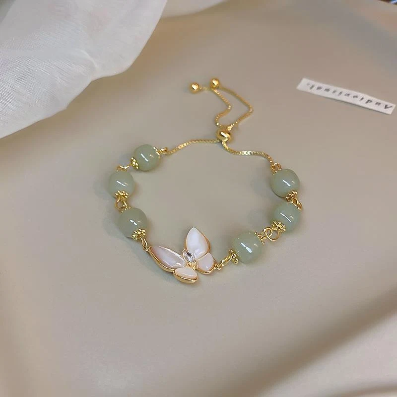 Koreaanse mode opaal vlinderarmband, een elegant sieraad voor dames, perfect om elke outfit te verfraaien en een vleugje verfijning toe te voegen.