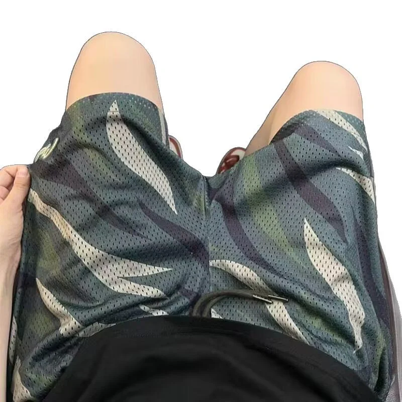 Camouflage Mesh Shorts for Men Stay cool and comfortable with these breathable shorts. Perfect for workouts, outdoor act