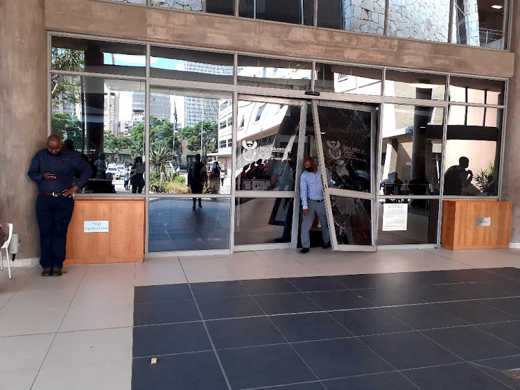 Protesting parents broke a door at the basic education department's Tshwane office on Monday.