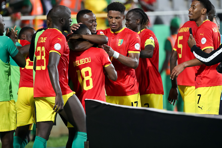 Aguibou Camara of Guinea celebrates with his teammates after scoring during the Africa Cup of Nations group stage match against Gambia at Stade Charles Konan Banny de Yamoussoukro on January 19, 2024 in Yamoussoukro, Ivory Coast.