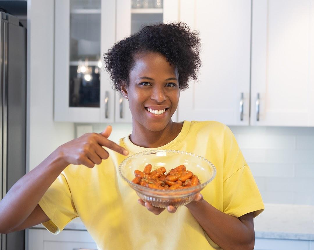 A person holding a bowl of food

Description automatically generated with medium confidence