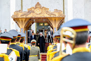 Iranian President Hassan Rouhani stands with Japan's Prime Minister Shinzo Abe, during a welcome ceremony in Tehran, Iran, on June 12 2019. 