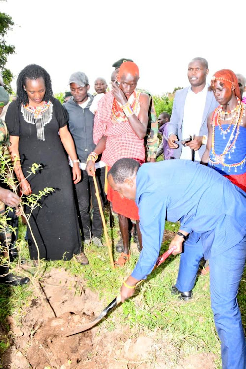 Environment CS Soipan Tuya at a tree planting exercise at Osinoni Secondary School, in Transmara West Sub County, Narok County on Wednesday January 4, 2023