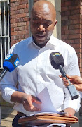 Build One SA leader Mmusi Maimane outside Cape Town central police station on Monday. 