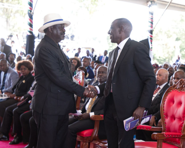 Azimio leader Raila Odinga and President William Ruto during the funeral of Field Marshal Mukami Kimathi in Nyandarua on May 13, 2023.