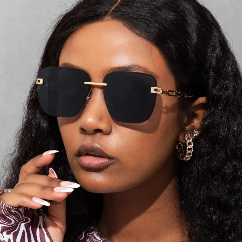 Lunettes de soleil carrées à coupe sans cadre et à la mode