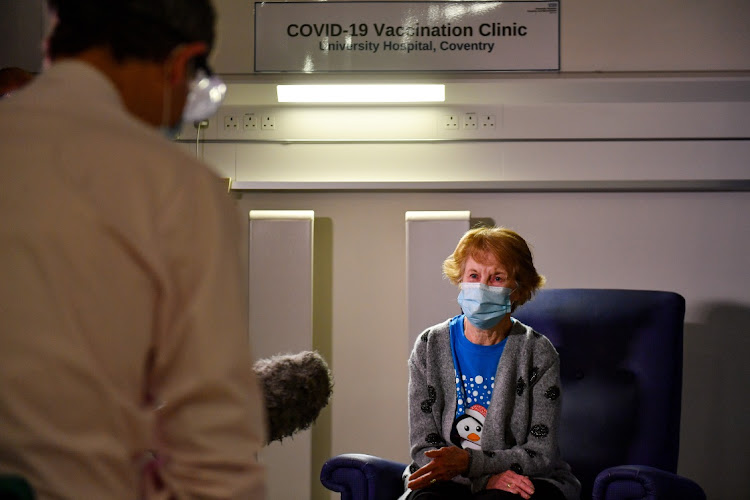 Margaret Keenan speaks to the media after becoming the first person in the UK to receive the Covid-19 vaccine, at University Hospital in Coventry in December 2020. Picture: PA WIRE/BLOOMBERG/JACOB KING