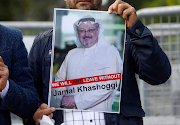 A demonstrator holds a picture of Saudi journalist Jamal Khashoggi during a protest in front of Saudi Arabia’s consulate in Istanbul, Turkey, October 5 2018. REUTERS/OSMAN ORSAL 