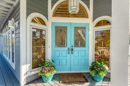 Blue double exterior door with plants - Prestige house for sale in Boca Grande, 4 bedrooms