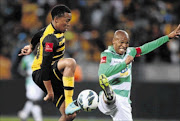 BACK IN ACTION
      : Kaizer Chiefs striker Lehlohonolo Majoro, left, fights for the ball with Bloemfontein Celtic defender Thabo Nthethe during their Premiership clash. Majoro will feature prominently when the two sides meet on Sunday
    
      Photo: Luke Walker/Gallo Images