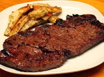 Drunken Steaks with Twice-Baked Peppercorn Fries was pinched from <a href="http://www.rachaelray.com/recipe.php?recipe_id=5268" target="_blank">www.rachaelray.com.</a>