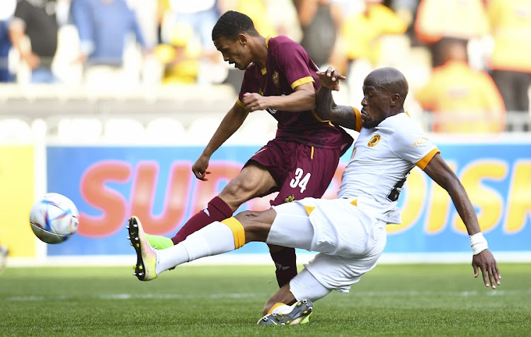 Devin Titus of Stellenbosch FC is challenged by Kaizer Chiefs' Sfiso Hlanti in the DStv Premiership match at Cape Town Stadium on October 9 2022.