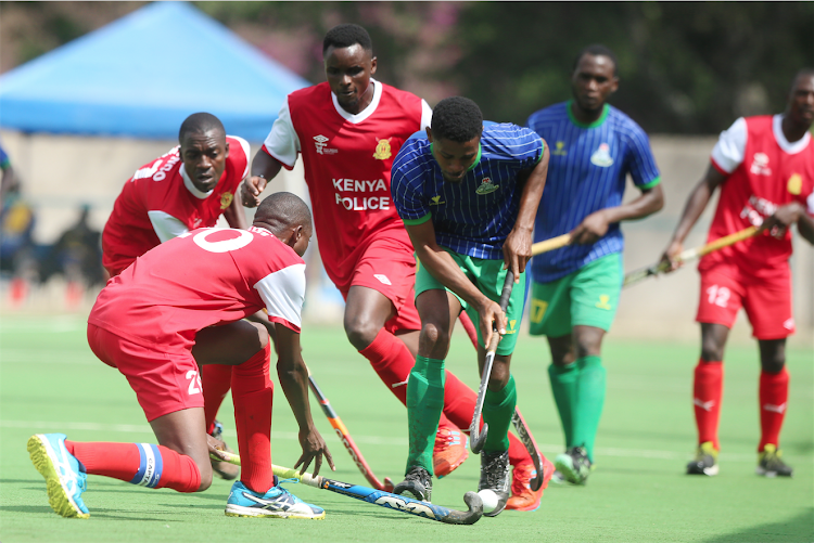 Henry Jayeoba (R) of Police Machine of Nigeria challenge Victor Wekesa of Kenya Police