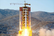 FILE PHOTO: A North Korean long-range rocket is launched into the air at the Sohae rocket launch site, North Korea, in this photo released by Kyodo February 7, 2016. North Korea launched a long-range rocket on Sunday carrying what it has called a satellite, but its neighbours and Washington denounced the launch as a missile test, conducted in defiance of U.N. sanctions and just weeks after a nuclear bomb test.  Mandatory credit 