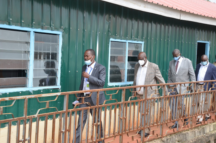 Murang'a Health CEC Joseph Mbai, Nacada CEO Victor Okioma and county commissioner Mohamed Barre at Kambirwa Eehabilitation Centre on Friday, July 10, 2020