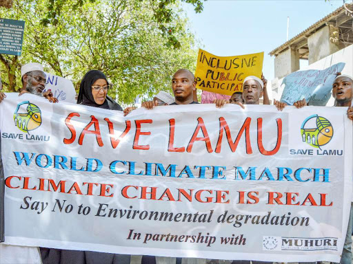 Lame residents takes part in a demonstration against the government plans to build coal plant in Lamu,/File