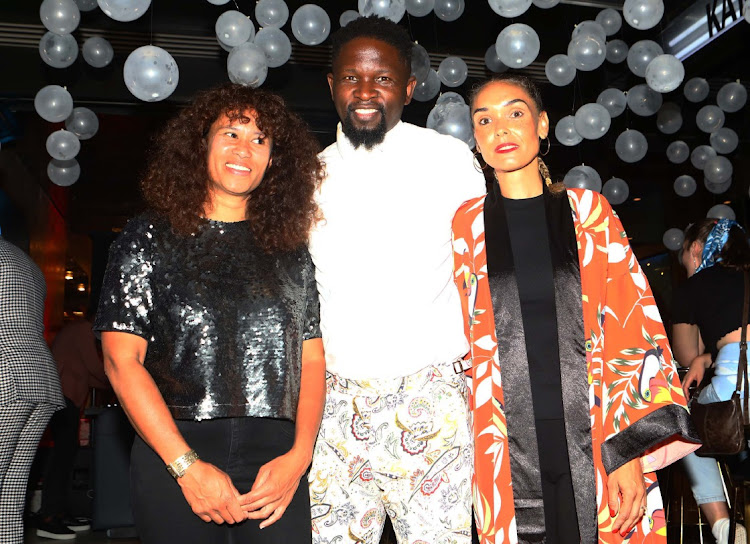 Shaniel Mjekevu, Monwabisi Thethe and his wife Cheslyn during the opening of their restaurant Kanpai in Rosebank.