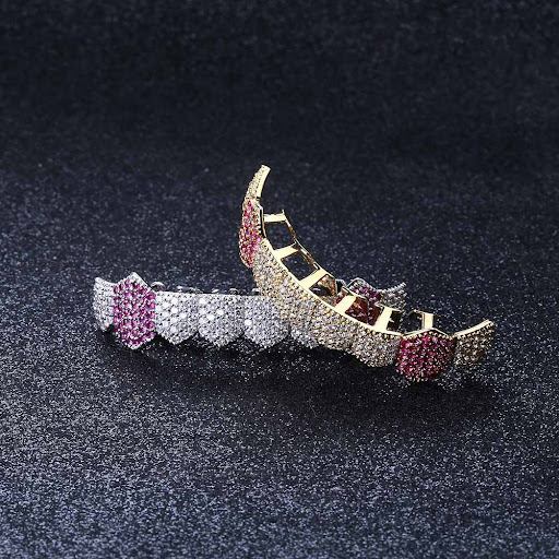 Title 1, Gold braces with zircon inlay for a dazzling sm...