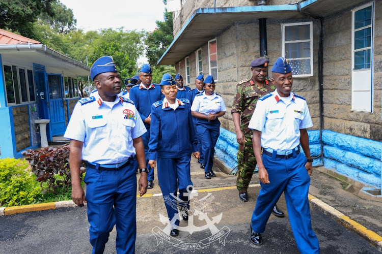 Major General Fatuma Ahmed in the company of other service personnel take a walk at the KAF Headquarters during the change of guard ceremony. On the left is Vice Chief of Defence Forces (VCDF) Lieutenant General John Omenda, May 9, 2024.