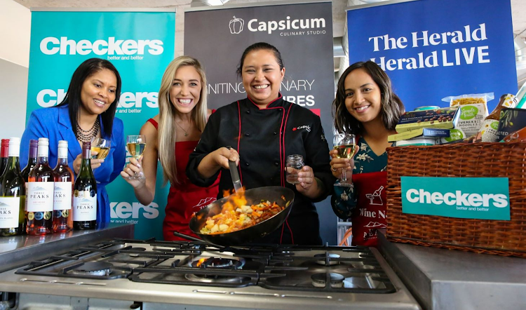 Capsicum Culinary Studio chef Nadia Pillay presents her tempting wok to, from left, Gqeberha Capsicum Culinary School principal Beryldene Bain, Mount Vernon Farms sales support and director of hospitality Sarah Weiss and The Herald and Weekend Post marketing manager Berna Ulay Walters.