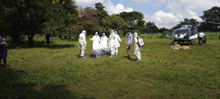 The coffin carrying the body of Antony Waswa upon arrival at Mukhweya village in Bungoma on Wednesday, May 20, 2020