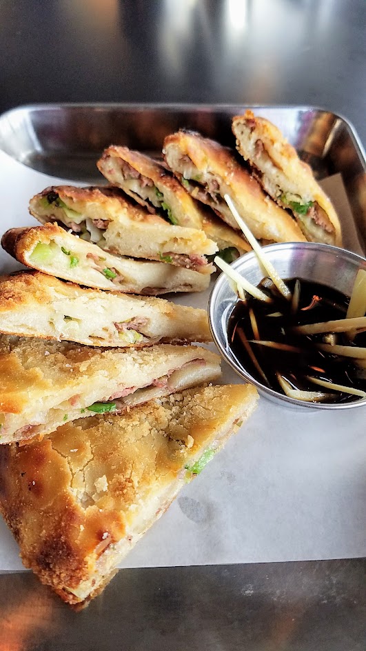 Danwei Canting Spiced Beef Jianbing with the minced beef sandwiched between the flaky dough layers