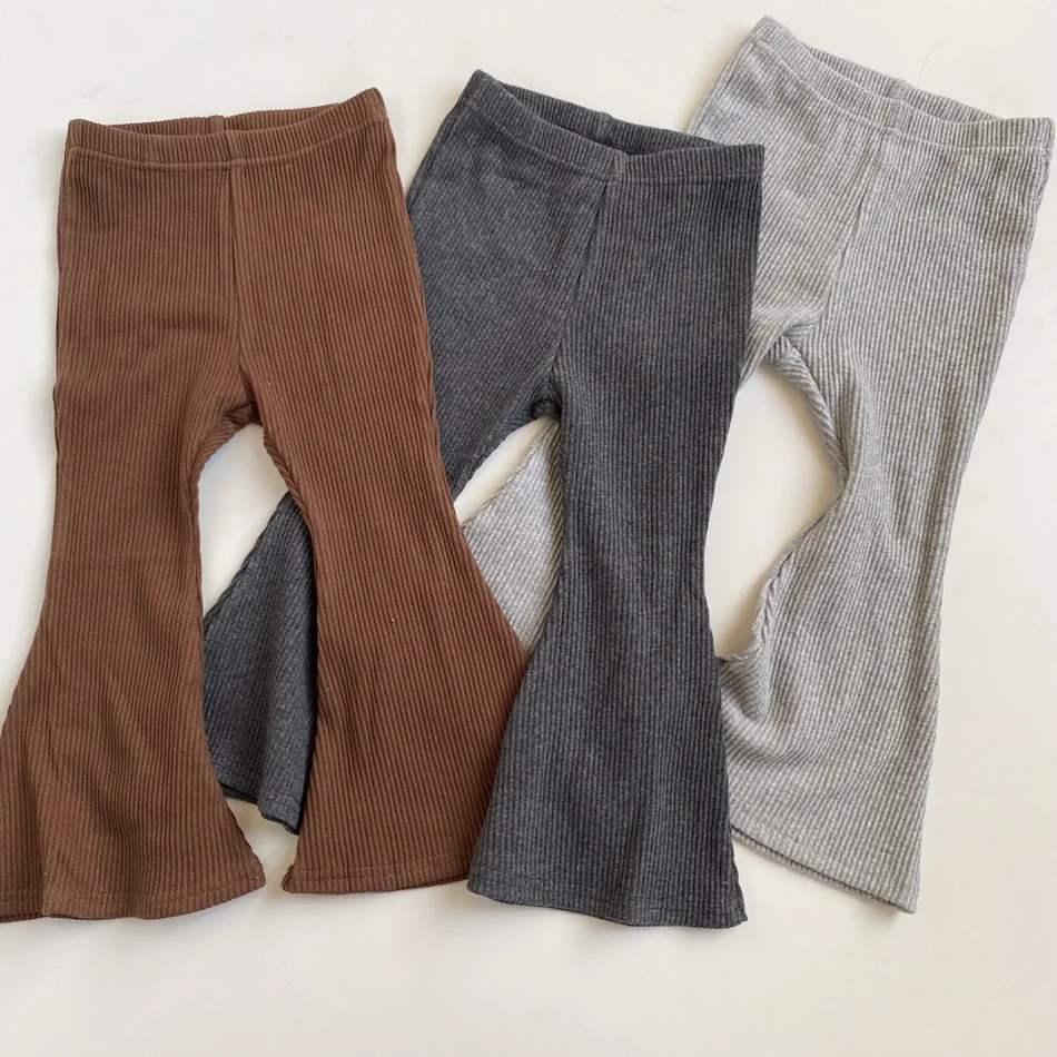 Pantalon fille printemps-été en coton à rayures, taille élastique, style rétro et tendance corne, polyvalent et facile à assortir, pour toutes occasions.