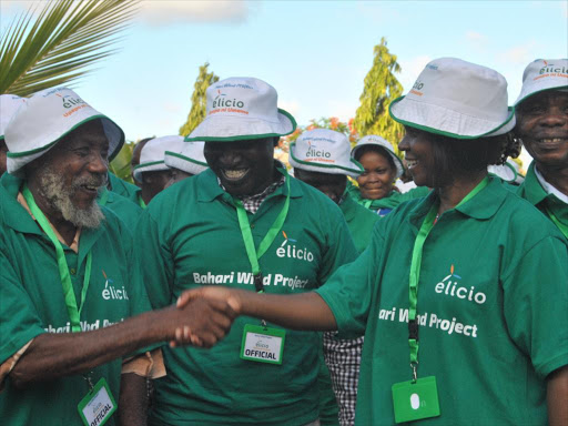 Susan Nandwa the Kenyan Director of the proposed Sh. 21 Billion Wind Energy project set to be initiated in Lamu with some of the farmers who leased their farms during a meeting to agree on modes of compensation in Mpeketoni Lamu West on Thursday. Photo Alphonce Gari