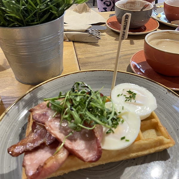 GF bacon and poached eggs waffle