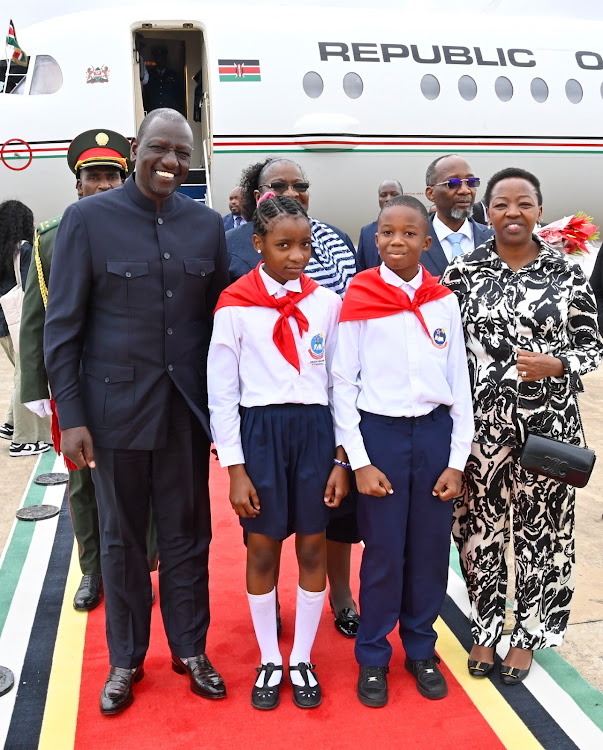 President William Ruto and First lady Rachel Ruto pose for a photo after arriving in Maputo, Mozambique on August 10, 2023
