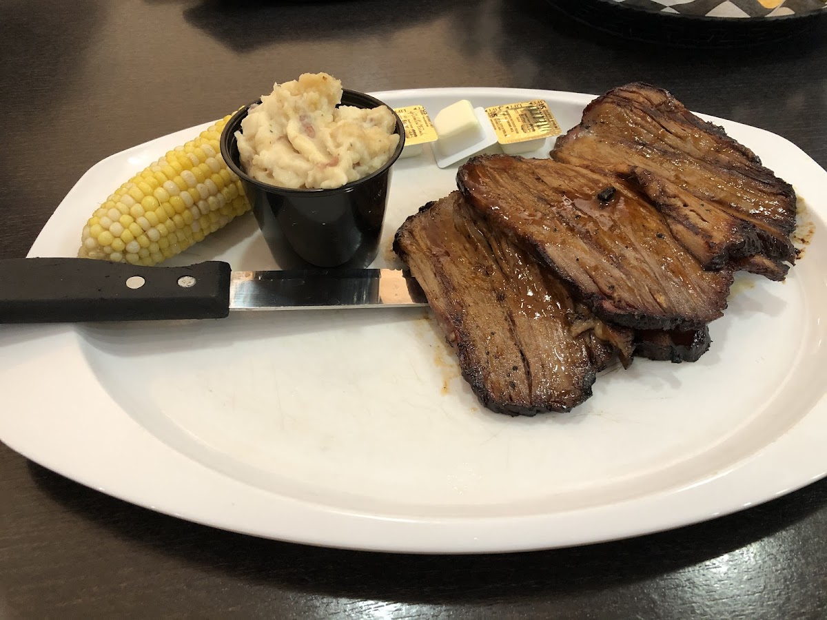 Brisket, mashed potatoes and corn