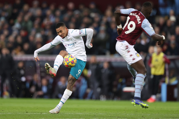 Gabriel Jesus of Manchester City takes a shot during the Premier League match against Aston Villa at Villa Park on December 1, 2021 in Birmingham