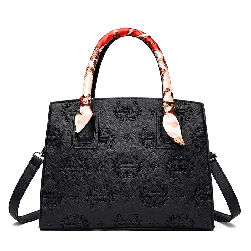 Sac à main et bandoulière pour femme embossé, grande capacité, tendance et populaire, pour emporter tout avec élégance.