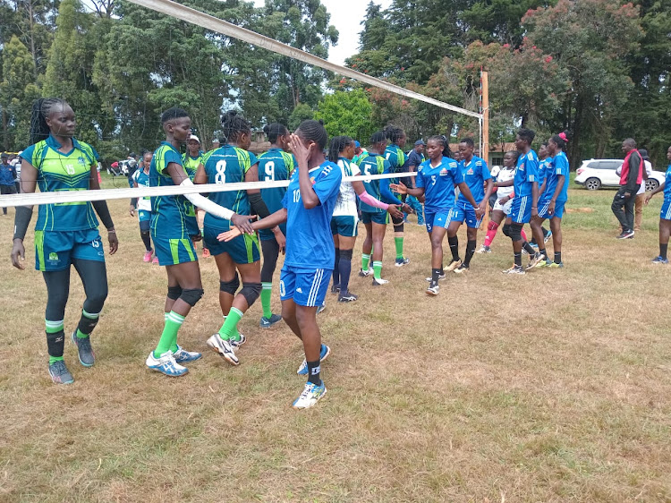 KCB players shake hands with Posta Bank players after their Kenya Volleyball Federation national League match at the Koitaleel Samoei University in Mosoriot, Nandi County.