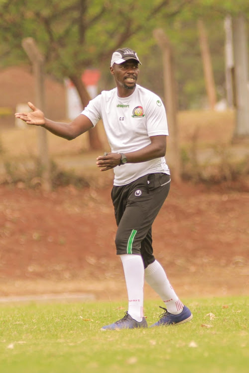 Charles Okere on the touchline in a past match