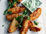 Moroccan-style roast potatoes with coriander yoghurt was pinched from <a href="http://www.thefoodfox.com/2012/07/13/moroccan-style-roast-potatoes-with-coriander-yoghurt/" target="_blank">www.thefoodfox.com.</a>