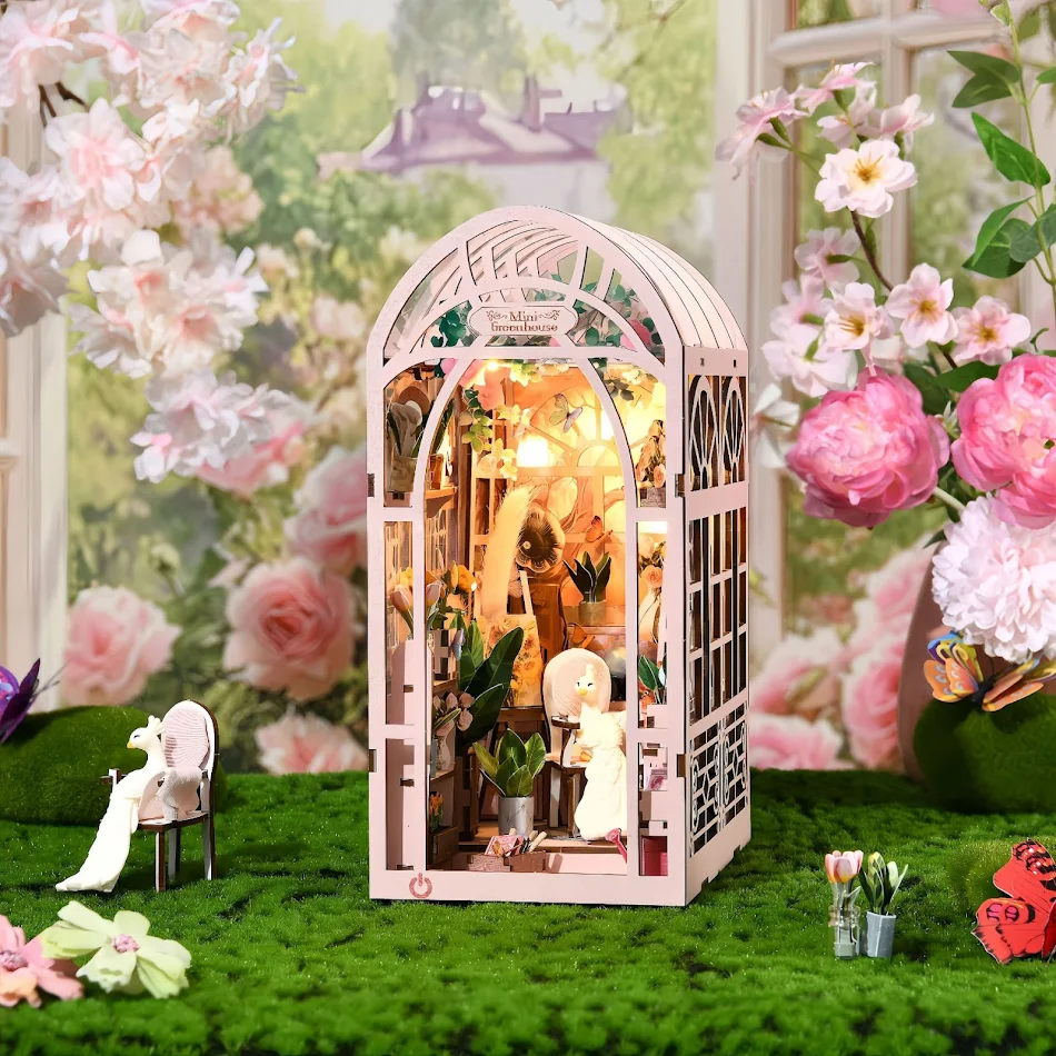 Hand-assembled DIY Cottage Mini Greenhouse Bookend Decoration. Enhance your shelves with a charming, handmade bookend fo