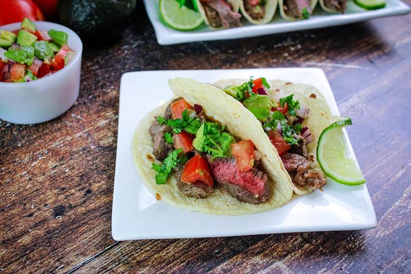 Add Steak And Salsa To The Warmed Tortillas.