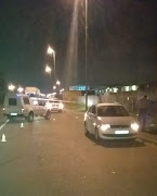 Cops on the scene of a shooting on Musa Dladla Drive in Wentworth, south of Durban, on Tuesday night.