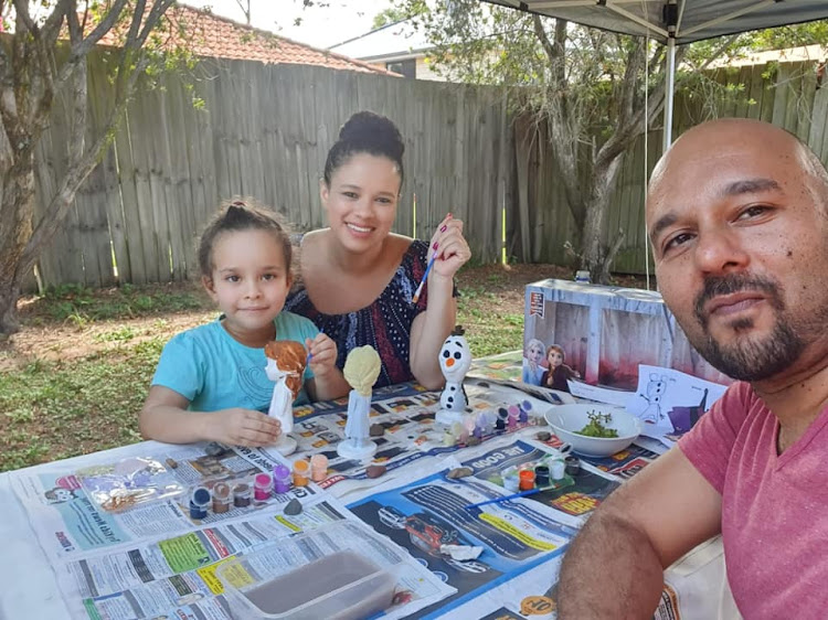 ART OF STAYING BUSY: Ex-Bay residents Mangus and Astralita Peterson enjoy some arts and crafts with their daughter, Peyton, 5, during stage two lockdown in Queensland, Australia