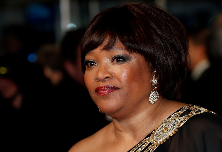 The late Zindzi Mandela, daughter of former South African president Nelson Mandela, arrives for the Royal premiere of "Mandela: Long Walk to Freedom" in London December 5, 2013. REUTERS/Suzanne Plunkett/File Photo